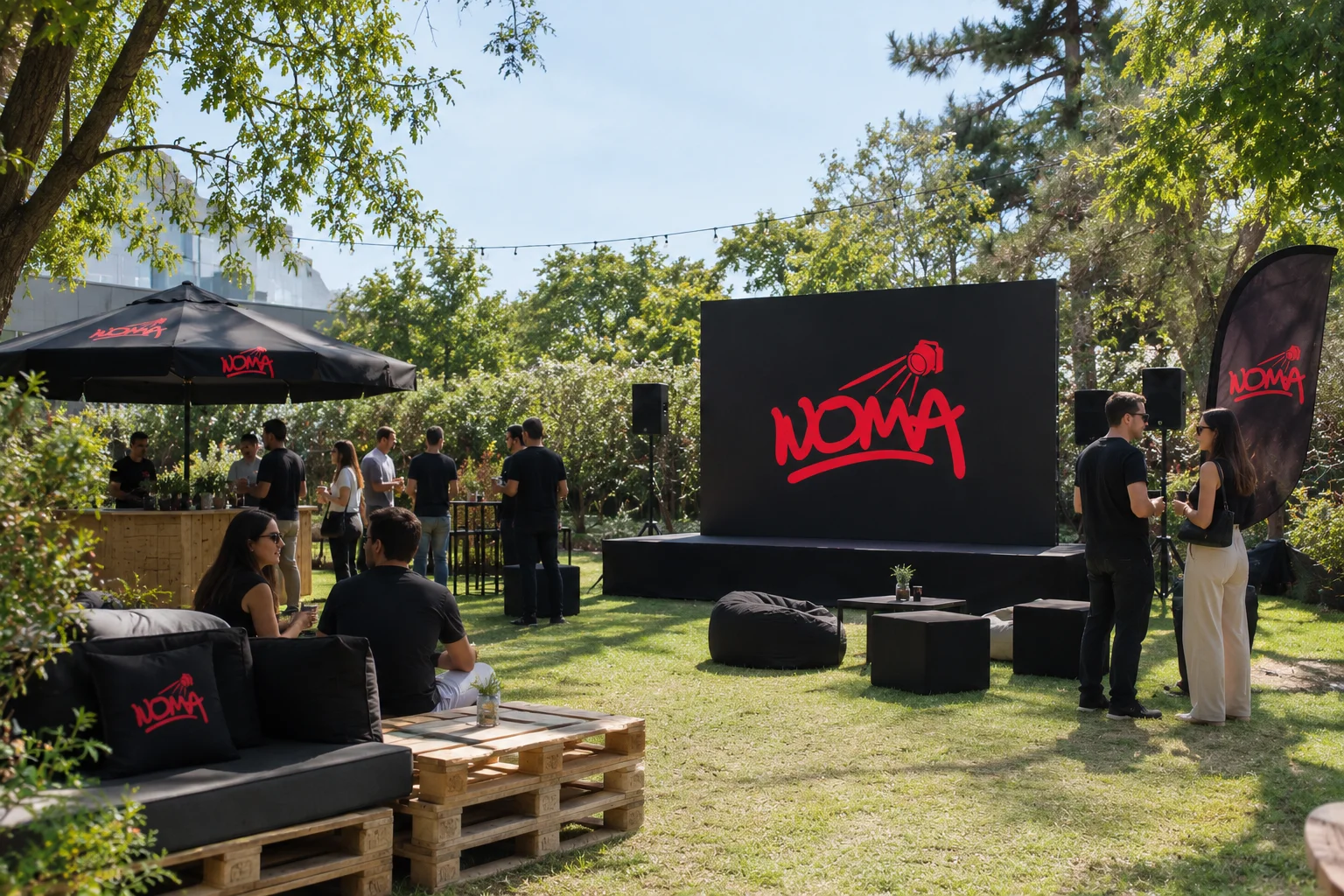 Evento corporativo al aire libre con branding NOMA completo